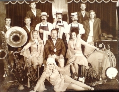 An Orchestra Photograph from 1972: John Arthy between three female singers.